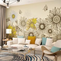 a living room with sunflowers painted on the wall