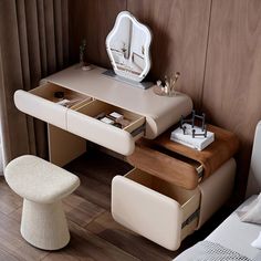 a bedroom with a vanity and stool in it