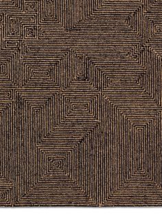 a black and brown area rug with squares on it