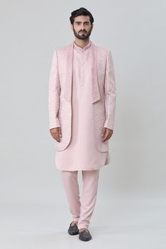 Peach short sherwani jacket with all over geometric butti embroidery. Paired with an inner sleeveless kurta and aligadhi pant. - Aza Fashions Pink Fitted Nehru Jacket, Designer Pink Sherwani, Festive Pink Designer Bandhgala, Designer Fitted Pink Kurta, Designer Pink Fitted Kurta, Designer Fitted Pink Sherwani, Fitted Pink Bandhgala For Ceremonial Occasions, Fitted Pink Kurta For Ceremonial Occasions, Designer Fitted Pink Bandhgala