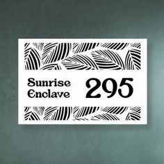 a black and white sign that says sunrise endlavve 205 on the side of a wall