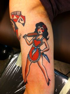 a woman with a kite tattoo on her arm