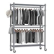 the garment rack is full of shirts and pants