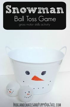 a snowman ball toss game with balls in it