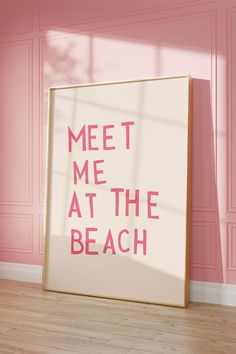 a pink and white poster with the words meet me at the beach written on it