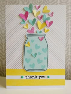 a thank card with hearts coming out of a jar