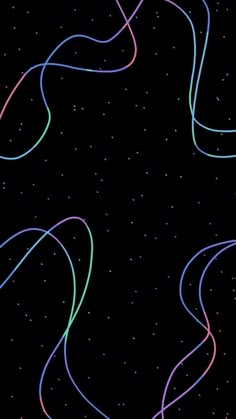 colorful streamers are flying through the air on a black background with stars and dots