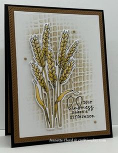 a close up of a card with wheat on it