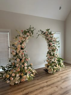 two floral archways in the middle of a room