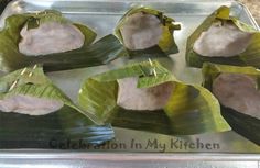 some food is sitting on top of a metal pan and ready to be cooked in the oven