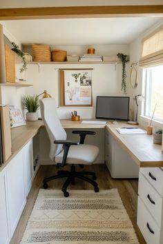 a home office area with desk, chair and computer