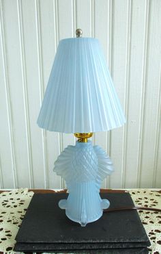 a lamp that is sitting on top of a table