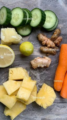 there are many fruits and vegetables on the table with each one's own name