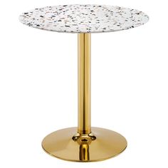 a white and gold table with dots on the top, in front of a white background