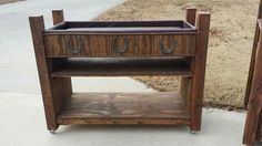 two wooden shelves with metal handles on them