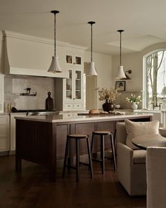 the kitchen is clean and ready to be used as a living room or dining area