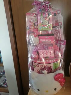 a hello kitty hamper is wrapped in plastic