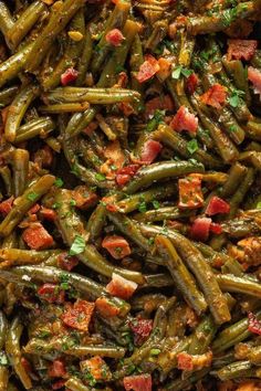 cooked green beans with bacon and parsley in a skillet, ready to be eaten