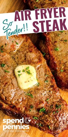 two steaks on a cutting board with butter and parsley in the middle, text says air fryer steak tender