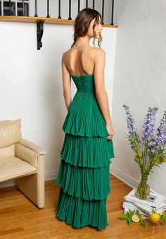 The Miyah is a fully pleated strapless dress . It has a with bustier style bodice with multi tiered skirt and an invisible zipper opening at back. Ruffled Formal Dress, Strapless Yellow Prom Dress, Maxi Dress With Ruffles, Green Ruffle Prom Dress, Green Maxi Dress With Ruffles, Preppy Prom Dresses Long, Nice Formal Dresses, Unique Formal Dress, Bright Green Prom Dress