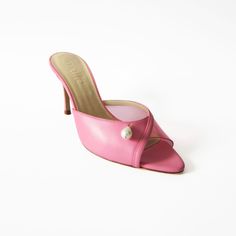 Elevate your footwear collection with Maile's Milly Pink Leather Heels, a true testament to elegance and luxury. These heels are meticulously crafted to offer both style and sophistication, perfect for making a fashion statement. With a pointed open toe and approximate heel height of 85mm/ 3. 35 inch, this style perfectly blends height and comfort. Adorned with a delicate pearl embellishment, these heels exude timeless style. Wipe clean Elegant 4-inch Kitten Heels With Single Toe Strap, Chic Sandals With 4-inch Heel For Galas, Formal Sandals With Sculpted Heel And Almond Toe, Designer Heels With Sculpted Heel And Single Toe Strap, Elegant Calf Leather Sandals With 4-inch Heel, Luxury Calf Leather Kitten Heels With Heel Strap, Luxury Wedding Shoes With 4-inch Heel, Designer Kitten Heels With Branded Heel Counter, Luxury Kitten Heels With Heel Strap