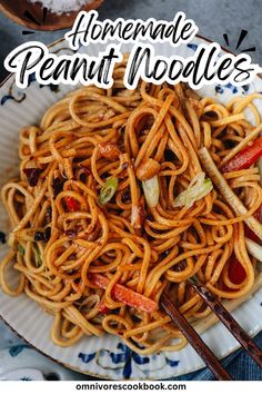 a plate full of homemade peanut noodles with chopsticks on the side and text overlay that reads homemade peanut noodles