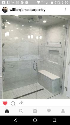 a bathroom with a walk in shower next to a toilet