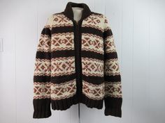 "Vintage 1950s Cowichan sweater. Made of brown and white knit wool. Has a zip front and two pockets. No label. About a size medium/large. Actual measurements are: 45\" around the chest 44\" around the waist 20\" shoulder to shoulder 28.5\" shoulder to end of cuff 31\" overall length In very good condition." Luxury Brown Vintage Sweater, Vintage Long Sleeve Brown Sweater, Vintage Fisherman Sweater, Retro Brown Wool Sweater, Vintage Coveralls, 1950s Sweater, 1970s Sweater, Cowichan Sweater, Distressed Sweatshirt