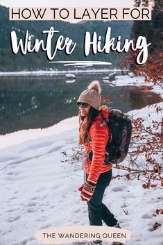 a woman walking in the snow with text overlay that reads how to layer for winter hiking