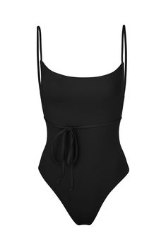 DESCRIPTION A perennial favorite, the K.M. Tie One-Piece is as chic as it is feminine. Our signature square neckline gives a nod to '90s minimalism while slender straps wrap elegantly around the waist. Finished with a high-cut leg and our classic cheeky bottom, this figure-flattering style will make you feel polished on any coast. We recommend sizing up. PRODUCT DETAILS Runs small, we recommend sizing up Tortoise ring detail UV protected UPF 50+, fully lined Pull-on & self-tie Slip-on Compositio 90s Minimalism, Tortoise Ring, Eco Swimwear, Swimwear Dress, Looks Chic, Square Necklines, High Cut, Square Neckline, Upf 50