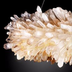 a cluster of crystals hanging from a chain