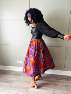 Gathered midi skirt in a gorgeous batik style African print fabric.  **READY TO POST** FREE matching head band/ scrunchy  with this skirt  Features; * Flat waist band  *Back Zip *Inseam Pockets *High Waist  Approx 33 inches long Purple Skirt Outfit, African Print Midi Skirt, Style Batik, Ankara Skirt, Skirt Purple, Batik Shirt, Skirts For Kids, Purple Skirt, Purple And Orange