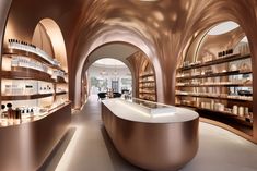 the inside of a store with shelves filled with bottles