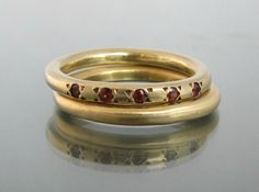 garnet gold ring gold ring garnet stackable by DaphneArtJewelry Garnet Ring Gold, Stackable Birthstone Rings, Gold Rings Stackable, Garnet And Gold, Stackable Bands, Gold Engagement, Gold Gemstone Ring, Garnet Jewelry, Gold Ring Stack