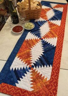 Gametime Table Runner by Cut Loose Press Pinwheel Block, Art Supplies Bag, College Colors, Quilted Table Runners Patterns, Embroidery Blanks, Placemats Patterns, Zigzag Pattern, Table Runner And Placemats, Table Runner Pattern