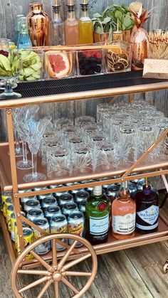 an old fashioned bar cart filled with drinks