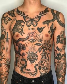 a man with lots of tattoos on his chest