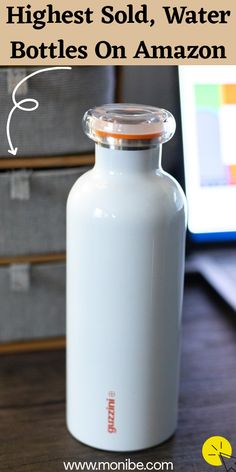 a white water bottle sitting on top of a wooden table