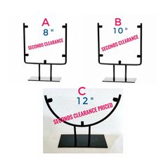 three different types of signs on stands with numbers and measurements for each item in front of them