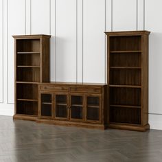 a wooden entertainment center sitting on top of a hard wood floor next to a white wall