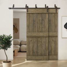 an open wooden door in a living room