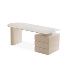 a white table sitting on top of a white floor