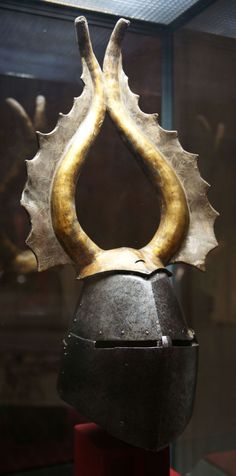 a helmet with horns on top of it