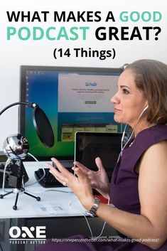 a woman with headphones on talking to someone in front of a computer