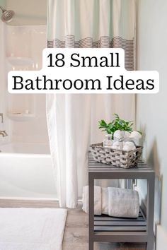 a bathroom with white towels and green plants on the shelf next to the bathtub