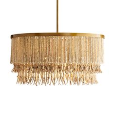 a chandelier with fringes hanging from the ceiling