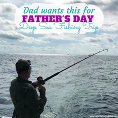 a man holding a fishing rod while standing on a boat with the caption dad wants this for father's day