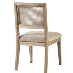 a wooden chair with a beige upholstered seat and backrest, against a white background