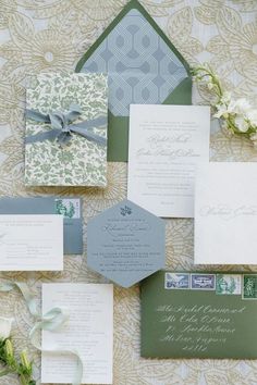 the wedding stationery was done in green and gray