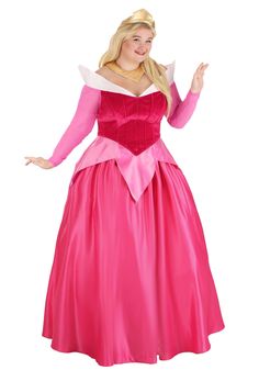 Dreams of Dancing
It can be an amazing feeling to dance and spin with the billowing skirt of a ball gown swishing at our feet! Perhaps that is part of what made us smile when seeing Disney's Princess Aurora dancing with her true love. Now you can experience that wonderful ballroom feeling when you put on our Plus Size Premium Disney Aurora Costume!
Design & Details
This officially licensed outfit will help you look just like Princess Aurora! The pink dress has a velvet bodice with piping details Princess Aurora Pink Dress, Aurora Pink Dress, Sleeping Beauty Halloween Costume, Sleeping Beauty Halloween, Princess Aurora Costume, Princess Aurora Dress, Aurora Costume, Sleeping Beauty Costume, Disney Princess Cosplay